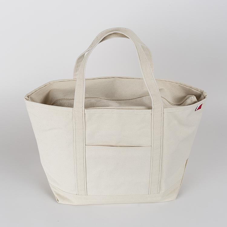 ShoreBags Classic Tote Large featuring reinforced handles and zippered top, ideal for beach and grocery use.