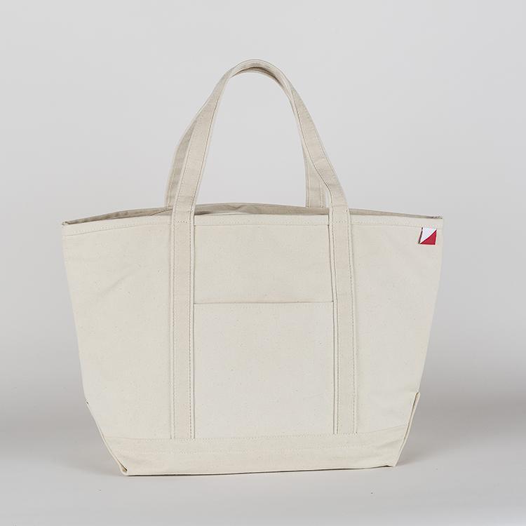 ShoreBags Classic Tote Large featuring reinforced handles and zippered top, ideal for beach and grocery use.