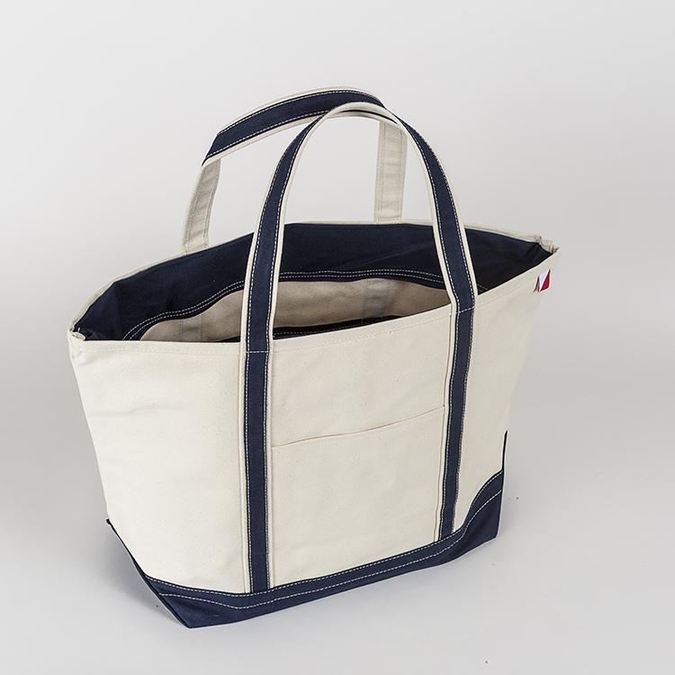 ShoreBags Classic Tote Large featuring reinforced handles and zippered top, ideal for beach and grocery use.