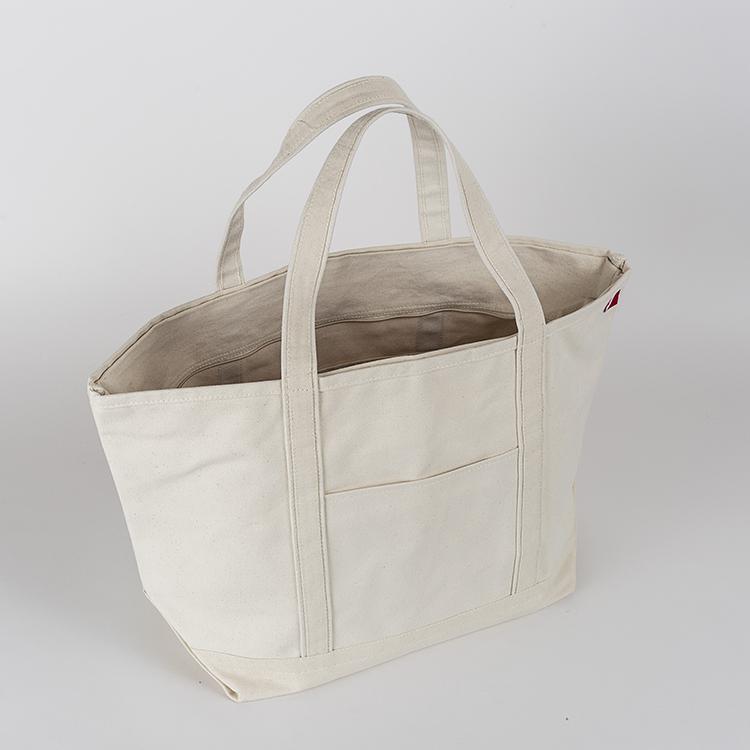 ShoreBags Classic Tote Large featuring reinforced handles and zippered top, ideal for beach and grocery use.