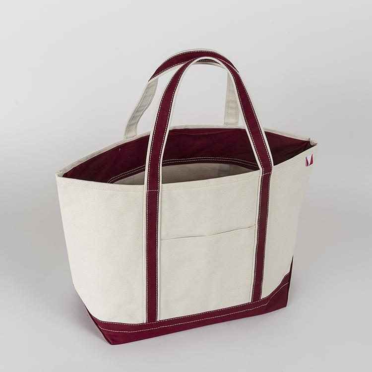 ShoreBags Classic Tote Large featuring reinforced handles and zippered top, ideal for beach and grocery use.