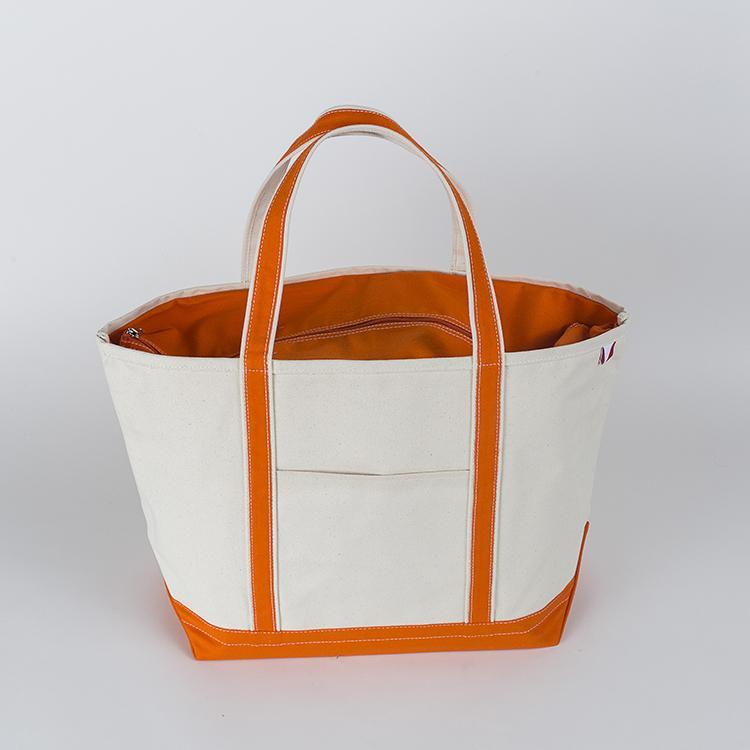 ShoreBags Classic Tote Large featuring reinforced handles and zippered top, ideal for beach and grocery use.