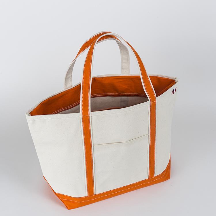 ShoreBags Classic Tote Large featuring reinforced handles and zippered top, ideal for beach and grocery use.