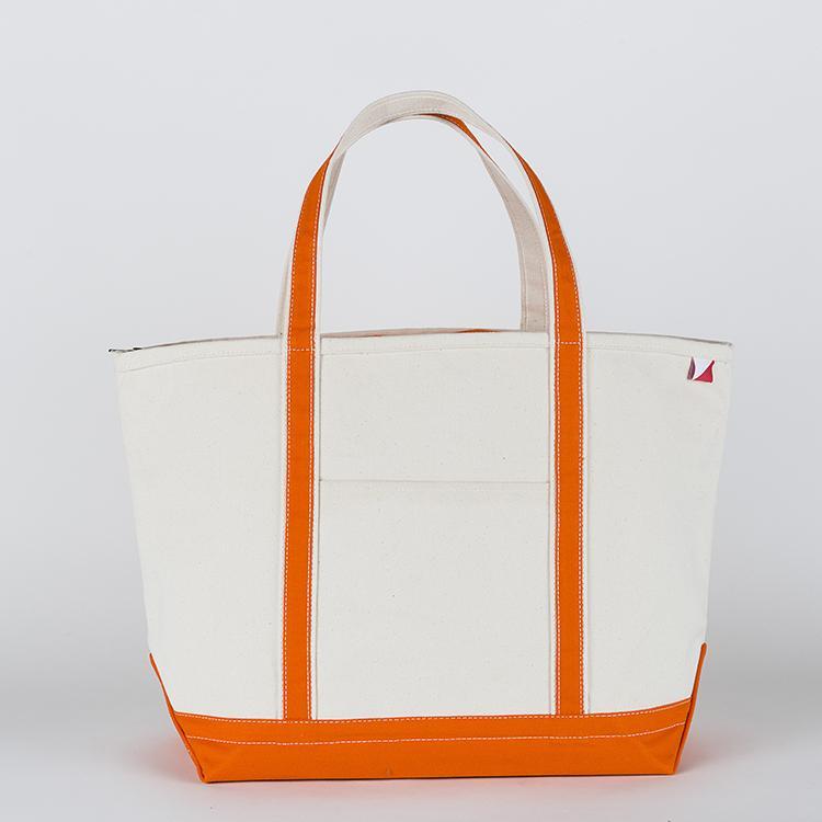 ShoreBags Classic Tote Large featuring reinforced handles and zippered top, ideal for beach and grocery use.