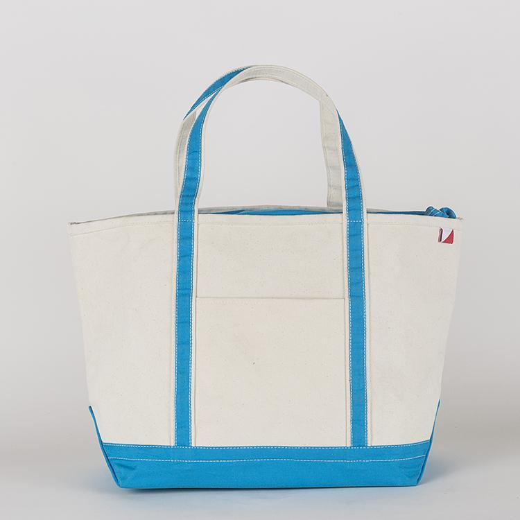 ShoreBags Classic Tote Large featuring reinforced handles and zippered top, ideal for beach and grocery use.