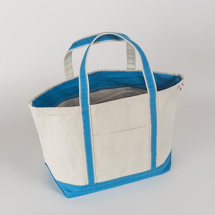 ShoreBags Classic Tote Large featuring reinforced handles and zippered top, ideal for beach and grocery use.