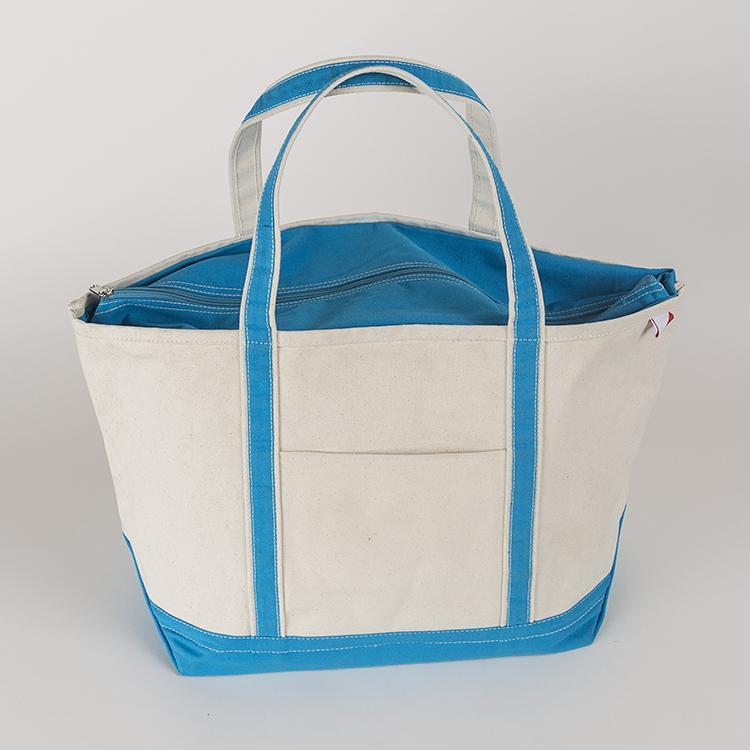 ShoreBags Classic Tote Large featuring reinforced handles and zippered top, ideal for beach and grocery use.