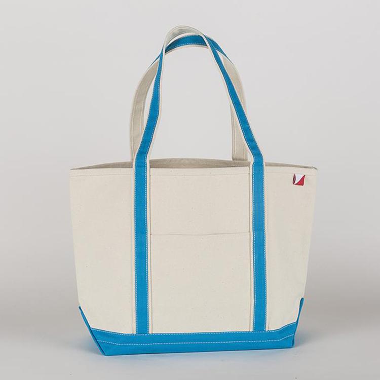 ShoreBags Classic Tote Large featuring reinforced handles and zippered top, ideal for beach and grocery use.