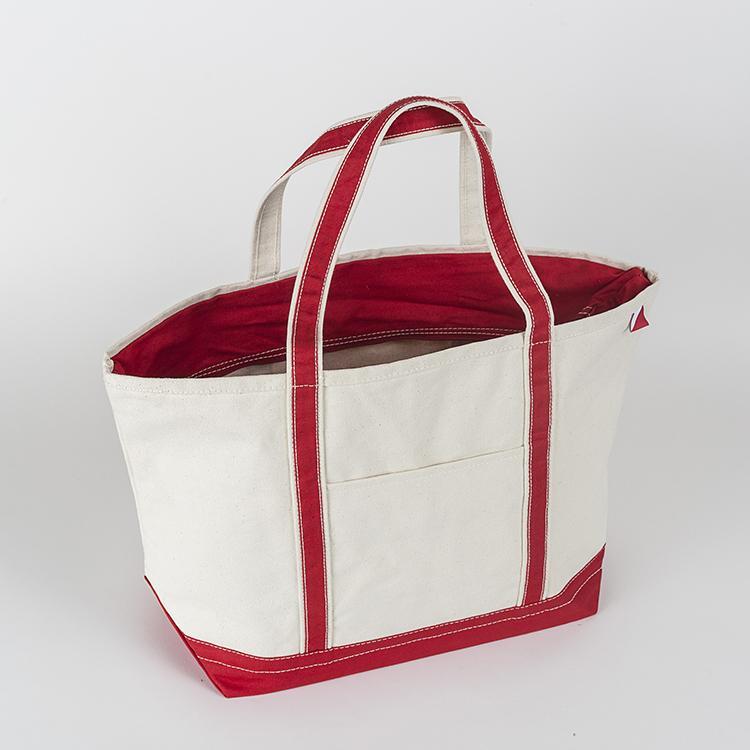 ShoreBags Classic Tote Large featuring reinforced handles and zippered top, ideal for beach and grocery use.