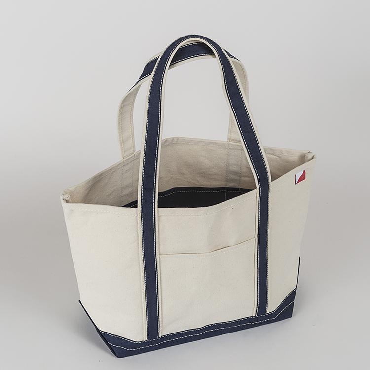 ShoreBags Classic Tote Medium in vibrant colors with double bottom and reinforced handles, showcasing its spacious interior and 360-degree pockets.