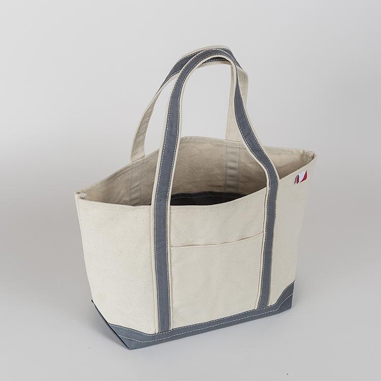 ShoreBags Classic Tote Medium in vibrant colors with double bottom and reinforced handles, showcasing its spacious interior and 360-degree pockets.