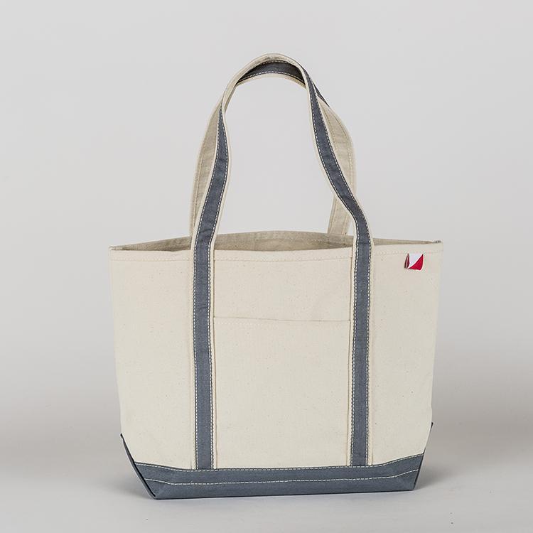 ShoreBags Classic Tote Medium in vibrant colors with double bottom and reinforced handles, showcasing its spacious interior and 360-degree pockets.