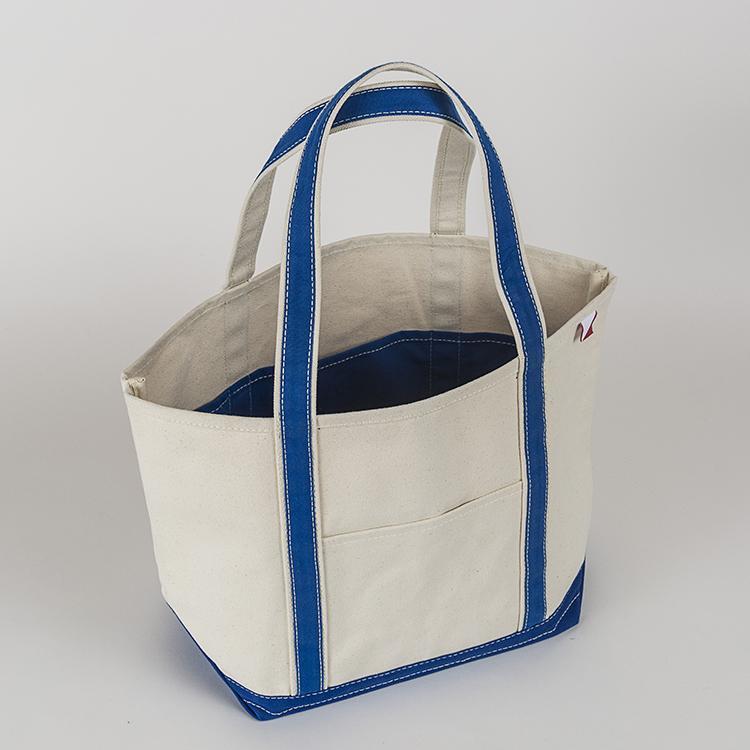 ShoreBags Classic Tote Medium in vibrant colors with double bottom and reinforced handles, showcasing its spacious interior and 360-degree pockets.