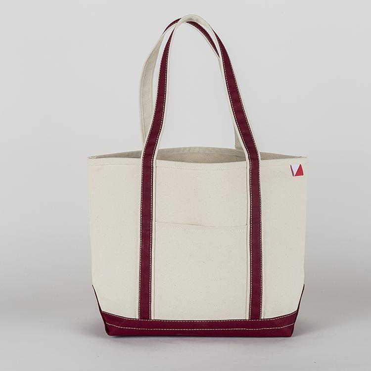 ShoreBags Classic Tote Medium in vibrant colors with double bottom and reinforced handles, showcasing its spacious interior and 360-degree pockets.