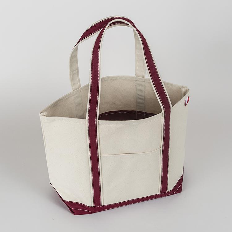 ShoreBags Classic Tote Medium in vibrant colors with double bottom and reinforced handles, showcasing its spacious interior and 360-degree pockets.