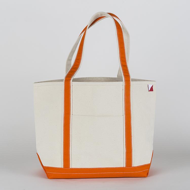 ShoreBags Classic Tote Medium in vibrant colors with double bottom and reinforced handles, showcasing its spacious interior and 360-degree pockets.