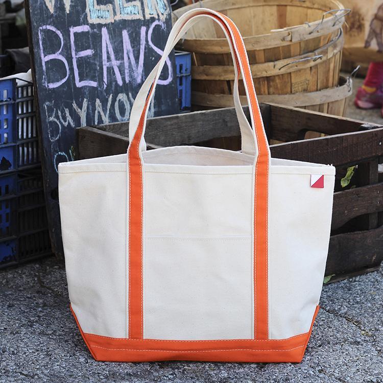 ShoreBags Classic Tote Medium in vibrant colors with double bottom and reinforced handles, showcasing its spacious interior and 360-degree pockets.