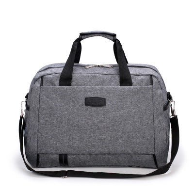 A stylish medium-sized short-distance business trip travel bag made of durable nylon, featuring a zipper pocket and soft handle, ideal for professionals.