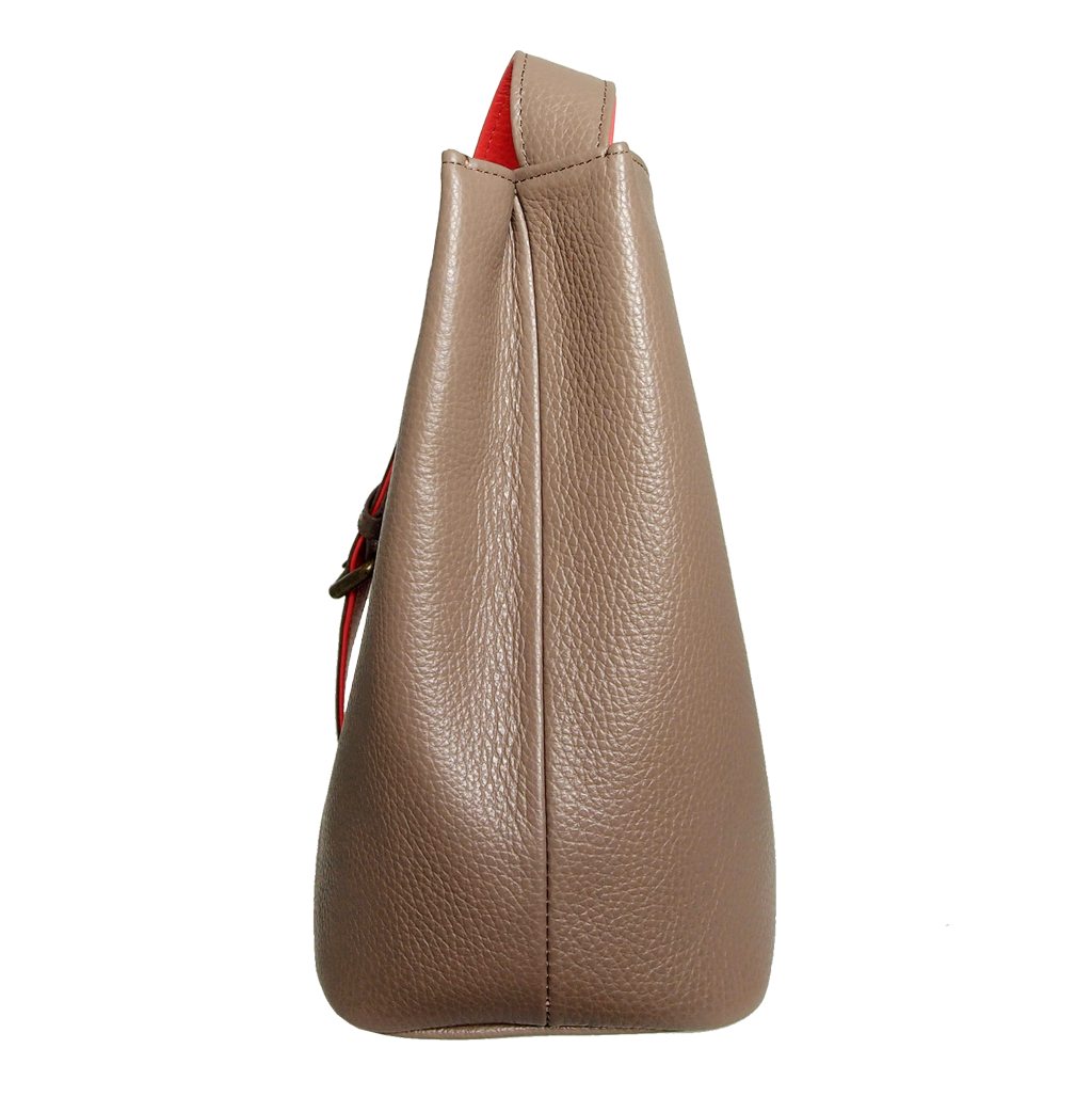 Shoulder Hobo Tote in Taupe-Coral made from pebbled Italian calf leather with a duo-tone strap and burnished brass buckle.