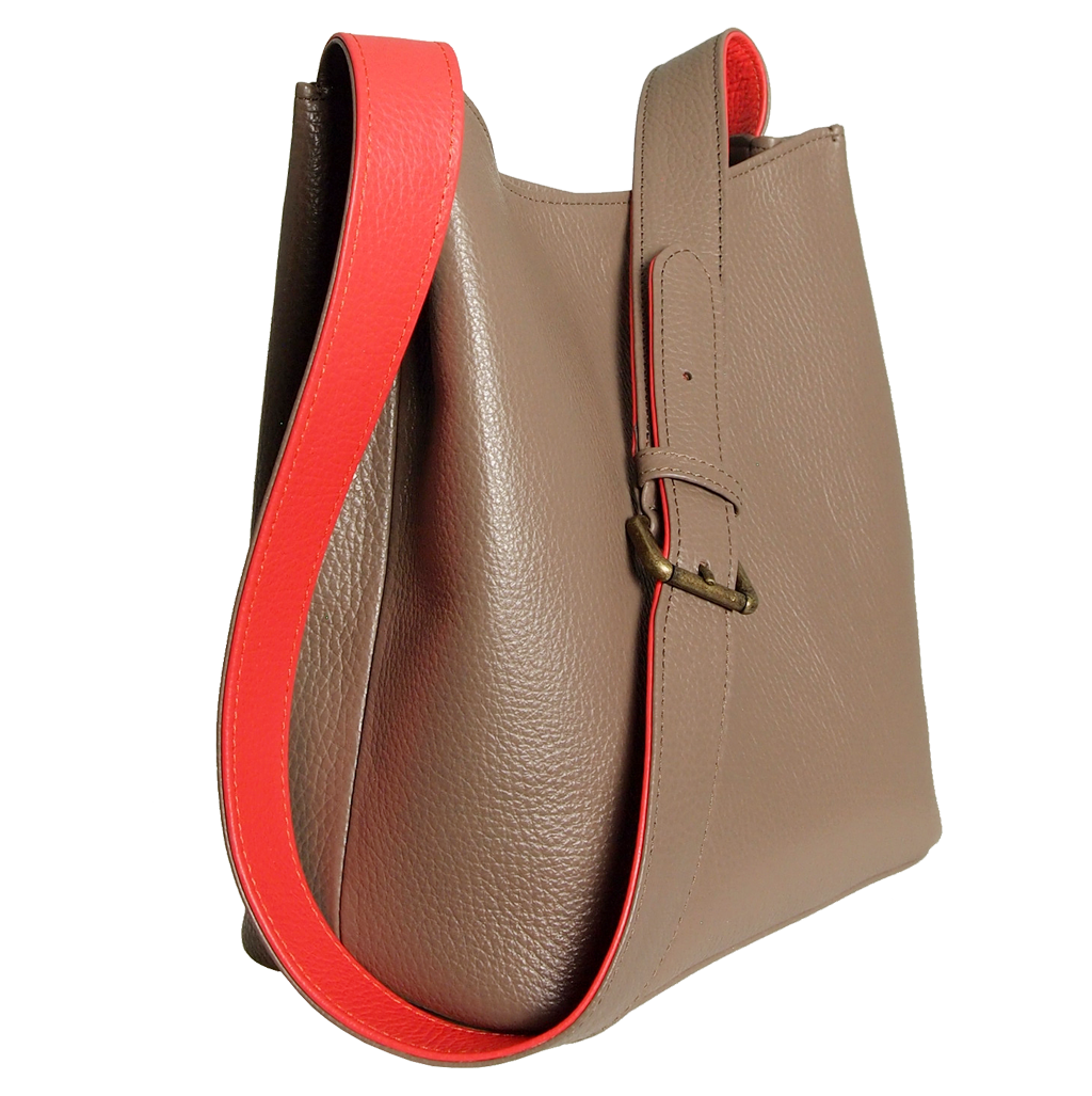 Shoulder Hobo Tote in Taupe-Coral made from pebbled Italian calf leather with a duo-tone strap and burnished brass buckle.