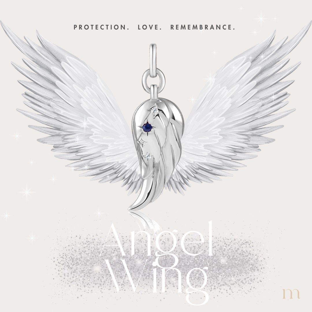 A detailed silver angel wing charm, symbolizing protection and remembrance, elegantly designed for jewelry lovers.