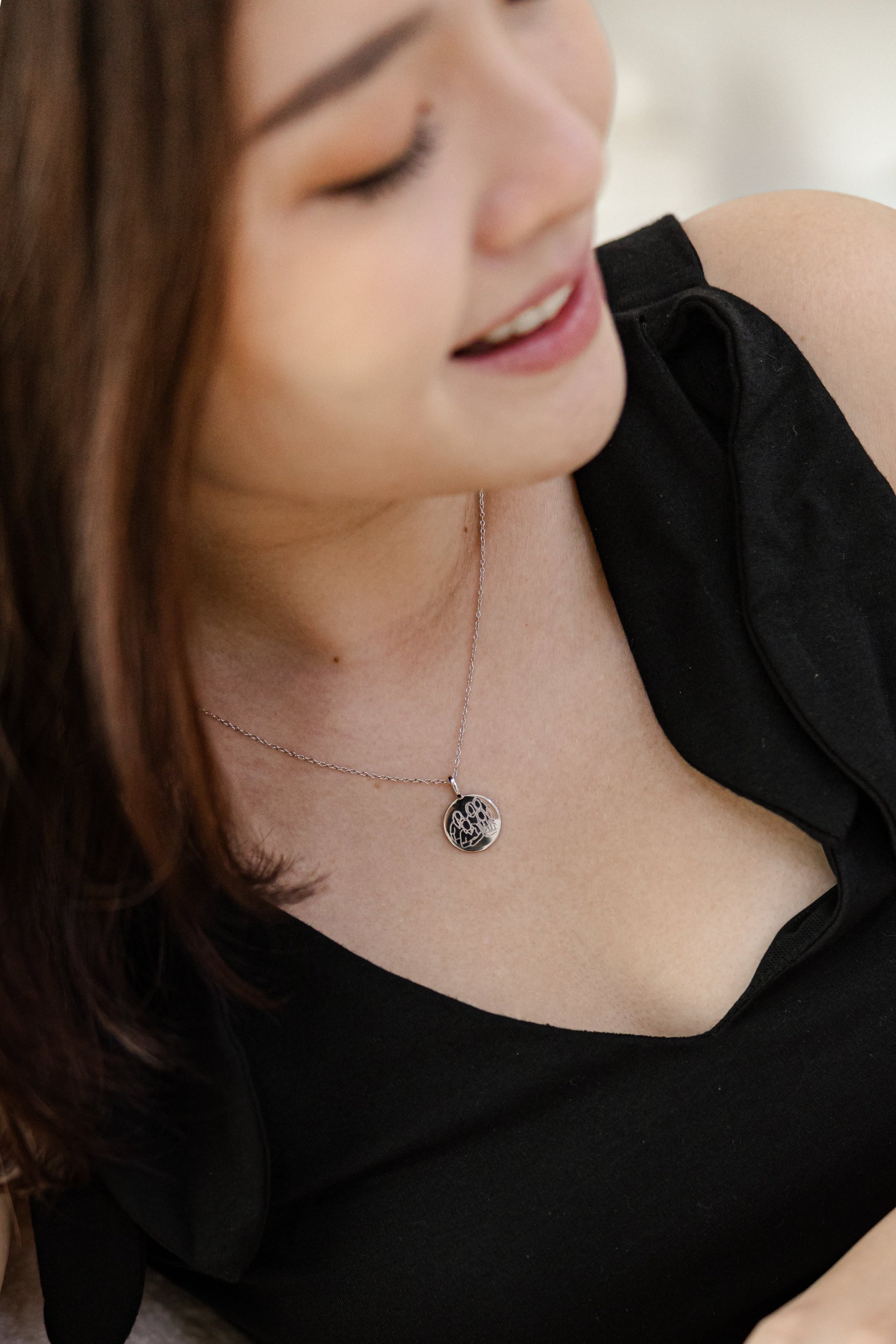 A stunning Silver Elegance Pendant Necklace featuring a personalized pendant and adjustable chain, perfect for any occasion.