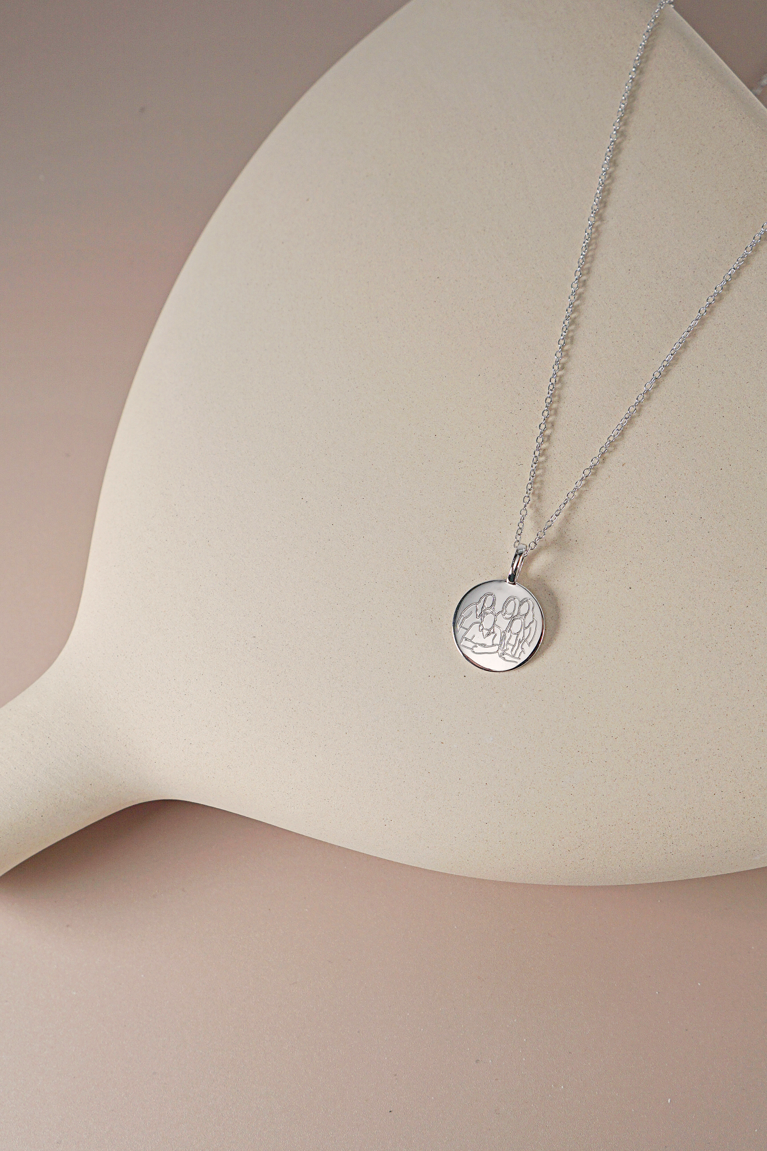 A stunning Silver Elegance Pendant Necklace featuring a personalized pendant and adjustable chain, perfect for any occasion.