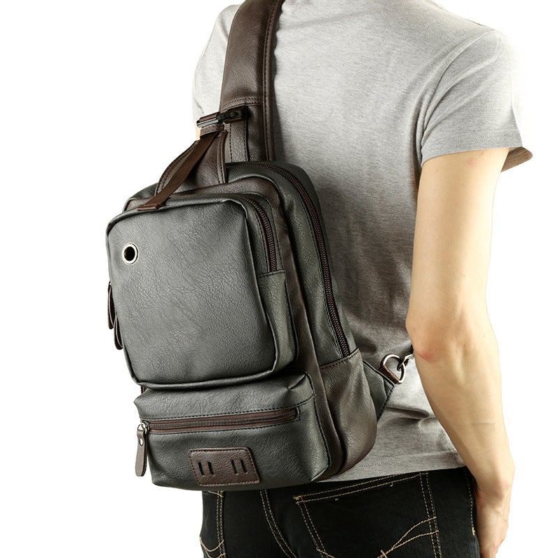 Simple Leisure Leather Chest Bag for Men, featuring a stylish design with multiple pockets and a soft handle for comfortable carrying.