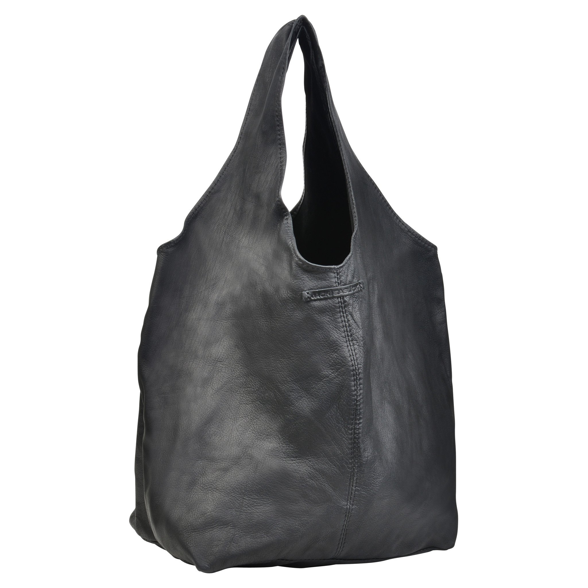 A stylish Simple Tote made from high-end cowhide leather, showcasing its spacious design and chic Manhattan-inspired look, handcrafted by Haitian artisans.