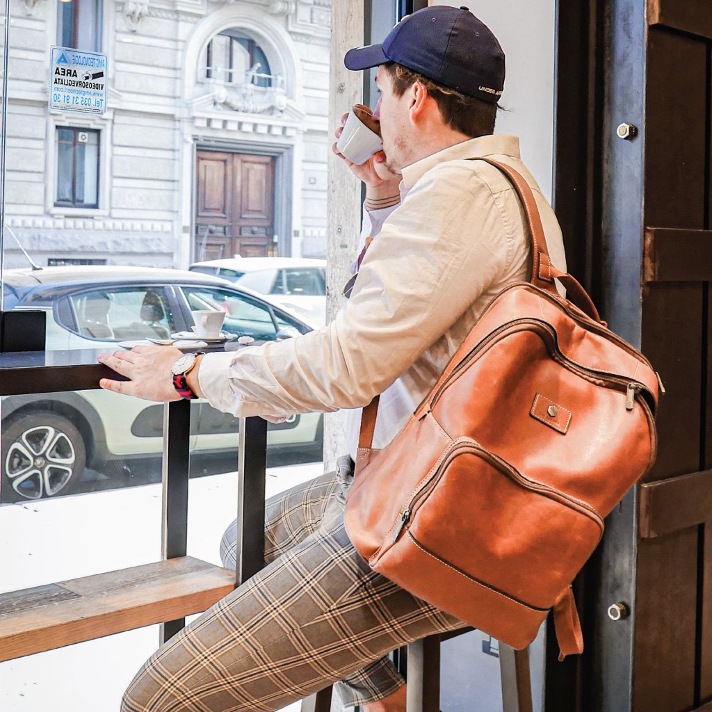 Single Compartment Backpack in black, featuring a spacious main compartment and padded shoulder straps for comfort.