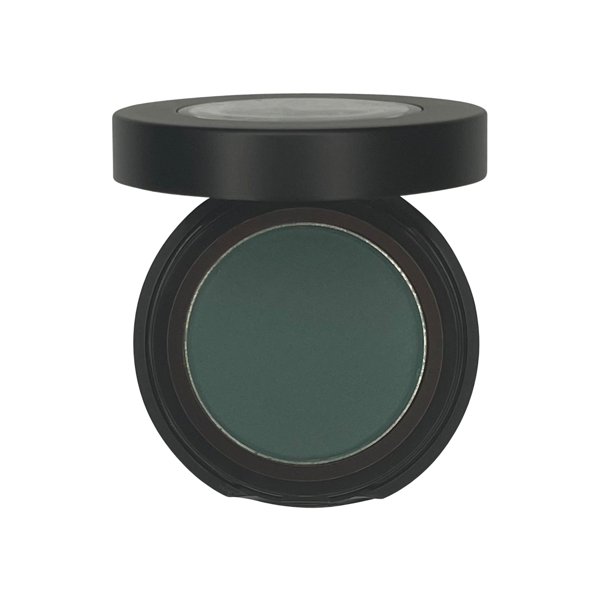 Single Pan Eyeshadow in Spruce, showcasing a rich green shade in a compact pan, perfect for blending and building color intensity.