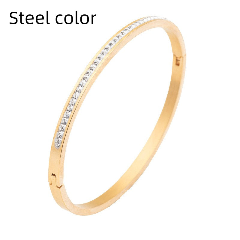 Single Row Stainless Steel Bracelet featuring sparkling rhinestones in various colors including steel, gold, and rose gold.