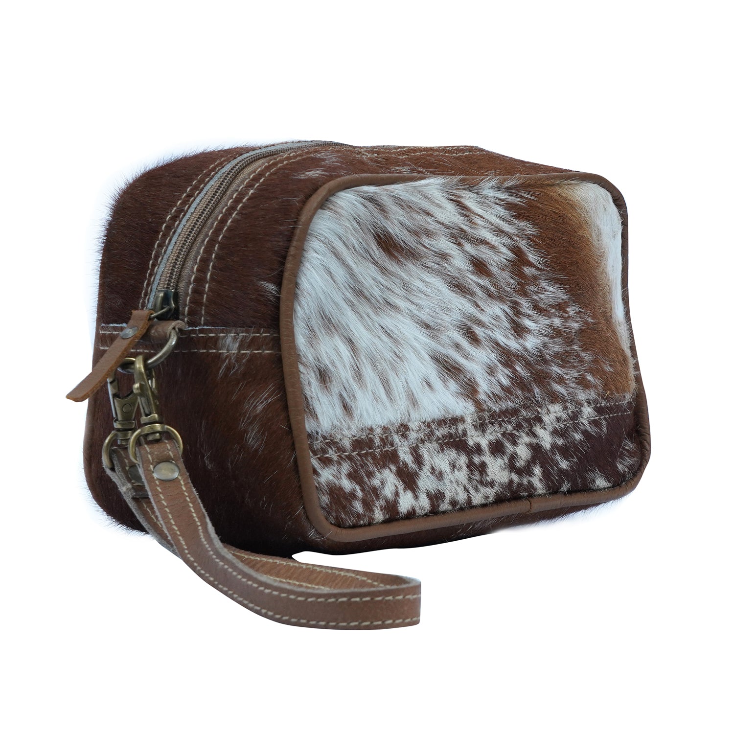 Skye Dopp Kit made of hairon and leather, showcasing its stylish design and durable construction.