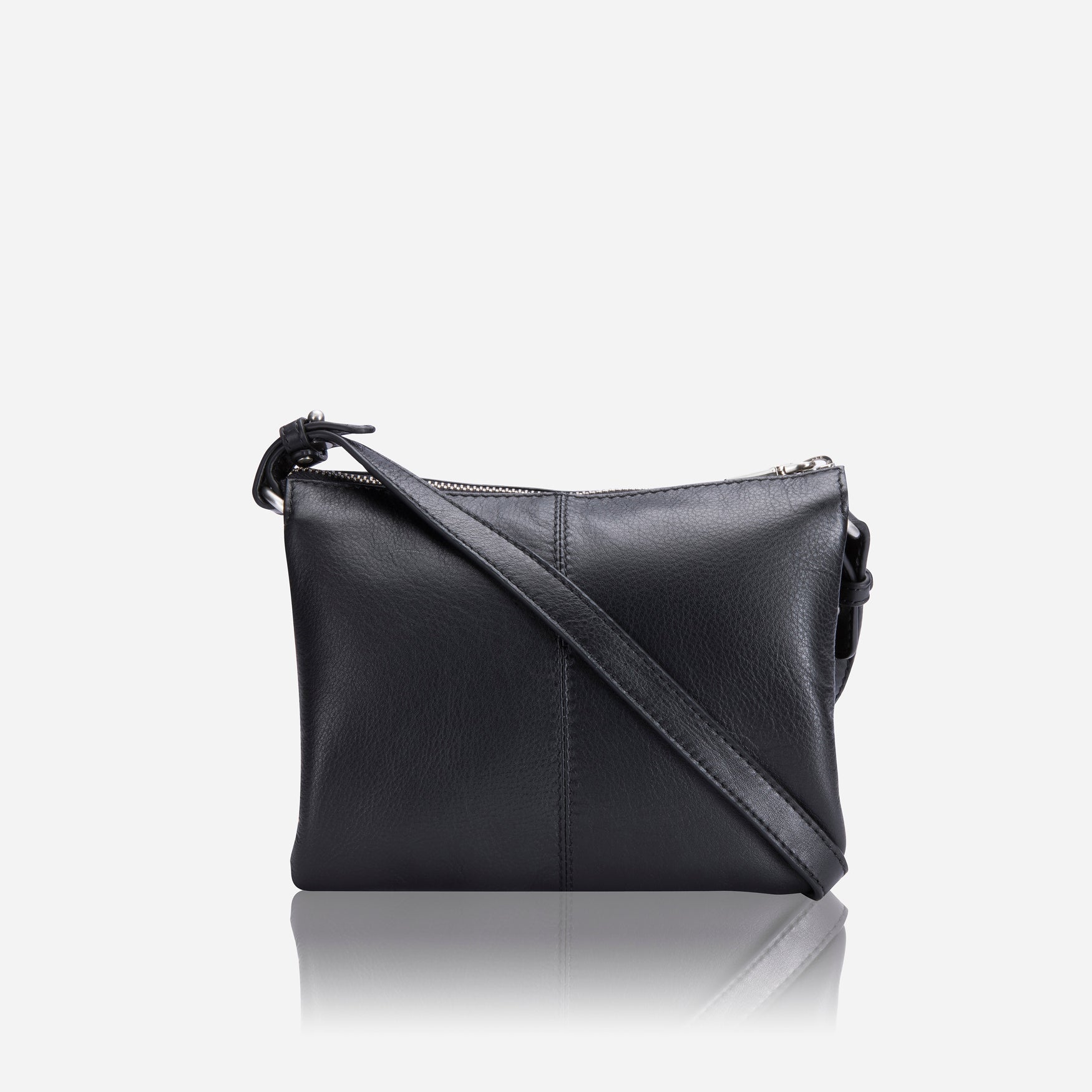 A stylish slim black leather crossbody handbag designed for ladies, featuring an adjustable strap and a sleek minimalist design.