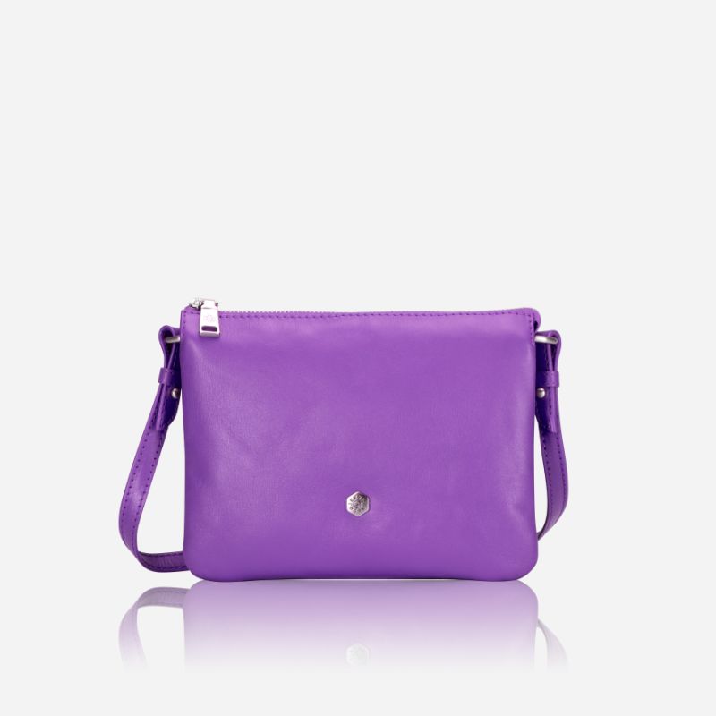 Slim Ladies Leather Crossbody bag in Electric Iris color, showcasing its stylish design and lightweight features.