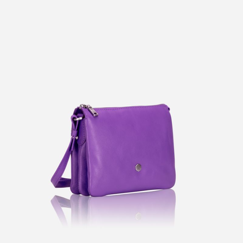 Slim Ladies Leather Crossbody bag in Electric Iris color, showcasing its stylish design and lightweight features.