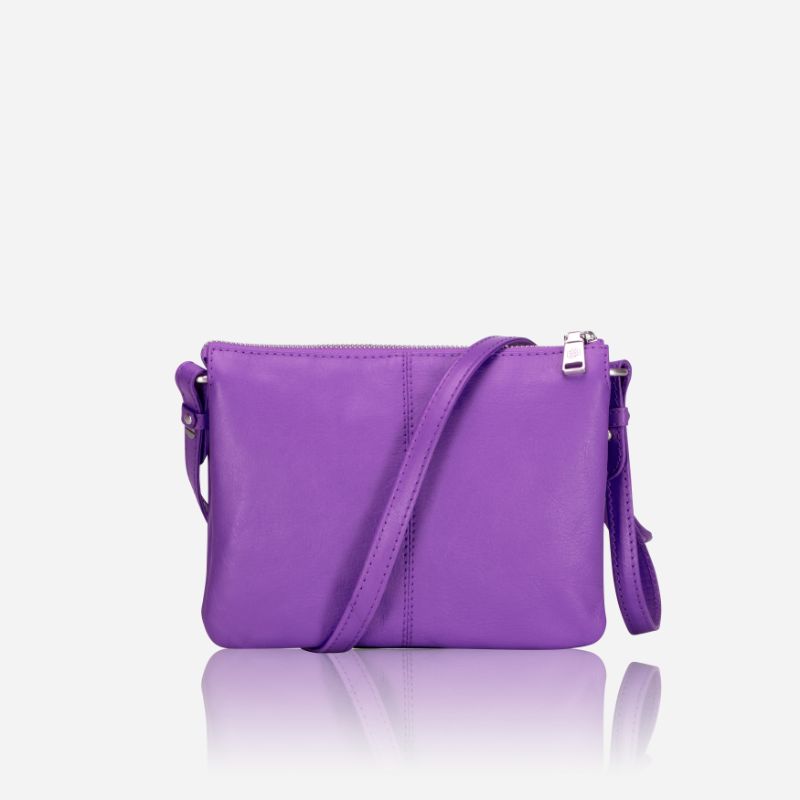 Slim Ladies Leather Crossbody bag in Electric Iris color, showcasing its stylish design and lightweight features.