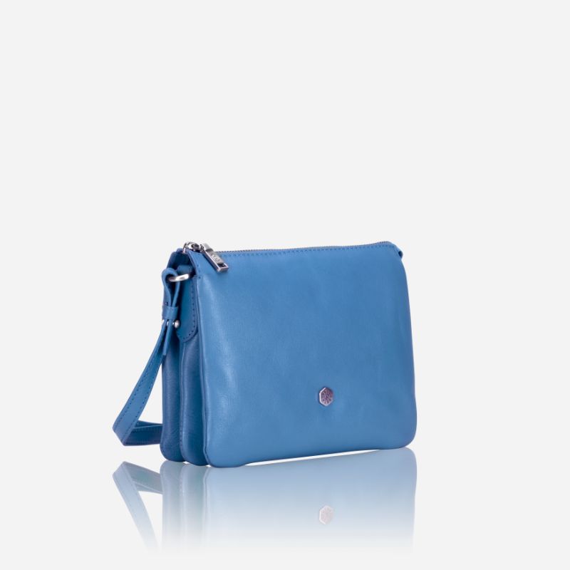 Slim Ladies Leather Crossbody handbag in sea glass color, featuring a sleek design and adjustable strap.