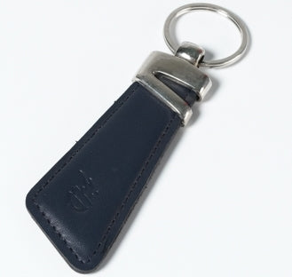 Slim blue leather keychain with silver key ring and JILD logo embossing.