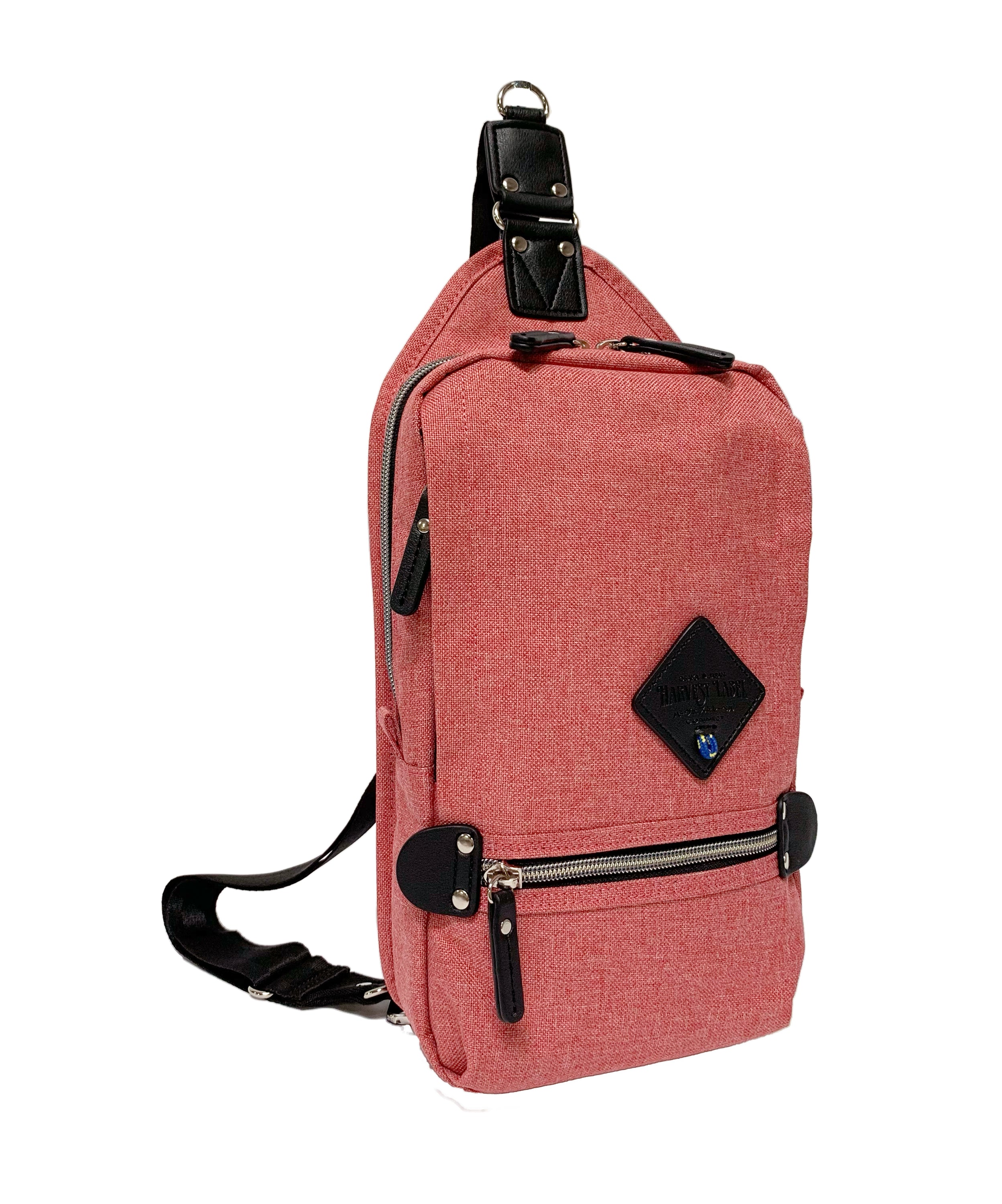 A stylish SLING PACK made from CORDURA® EcoMade Polyester, featuring multiple pockets and an adjustable strap, available in various colors.