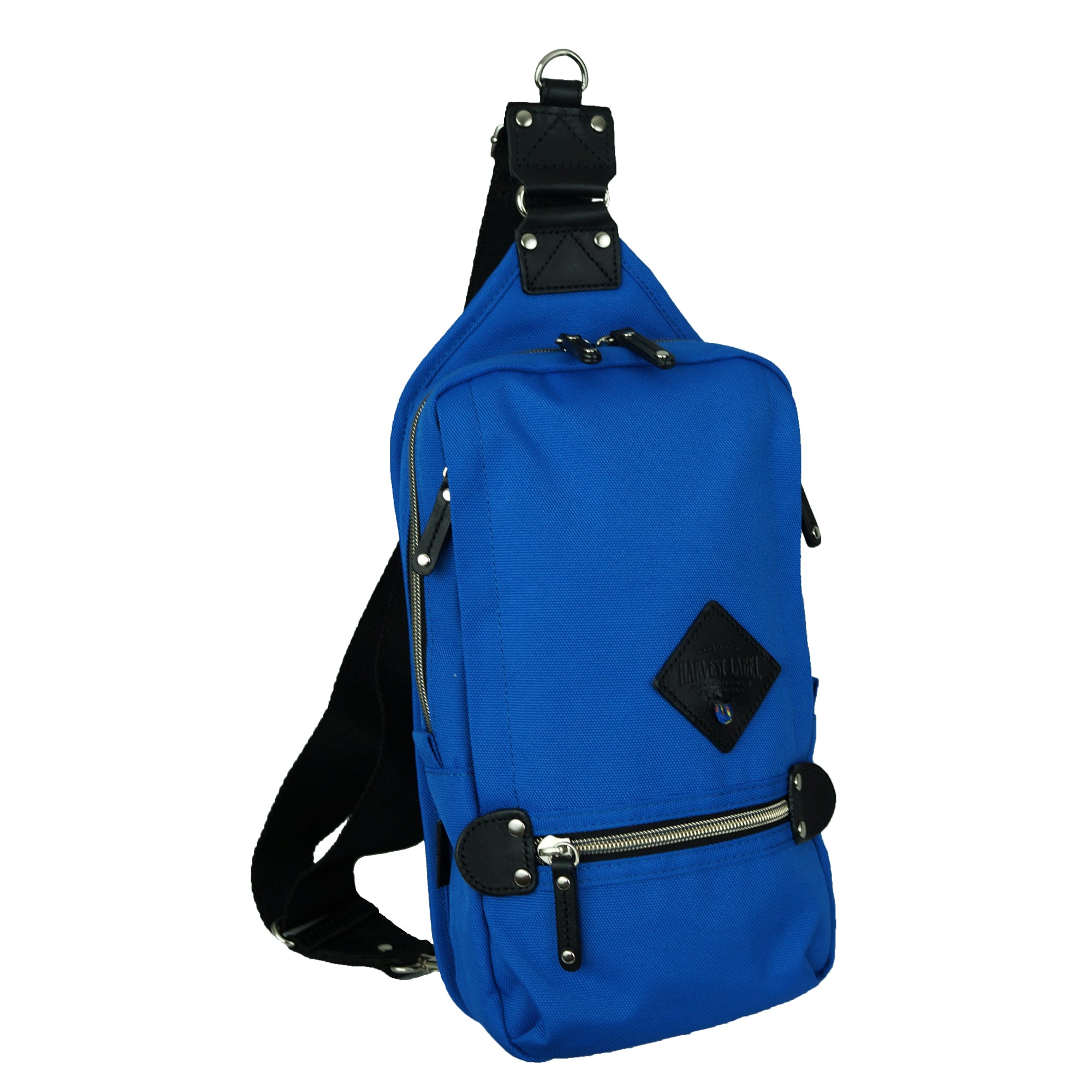 A stylish SLING PACK made from CORDURA® EcoMade Polyester, featuring multiple pockets and an adjustable strap, available in various colors.