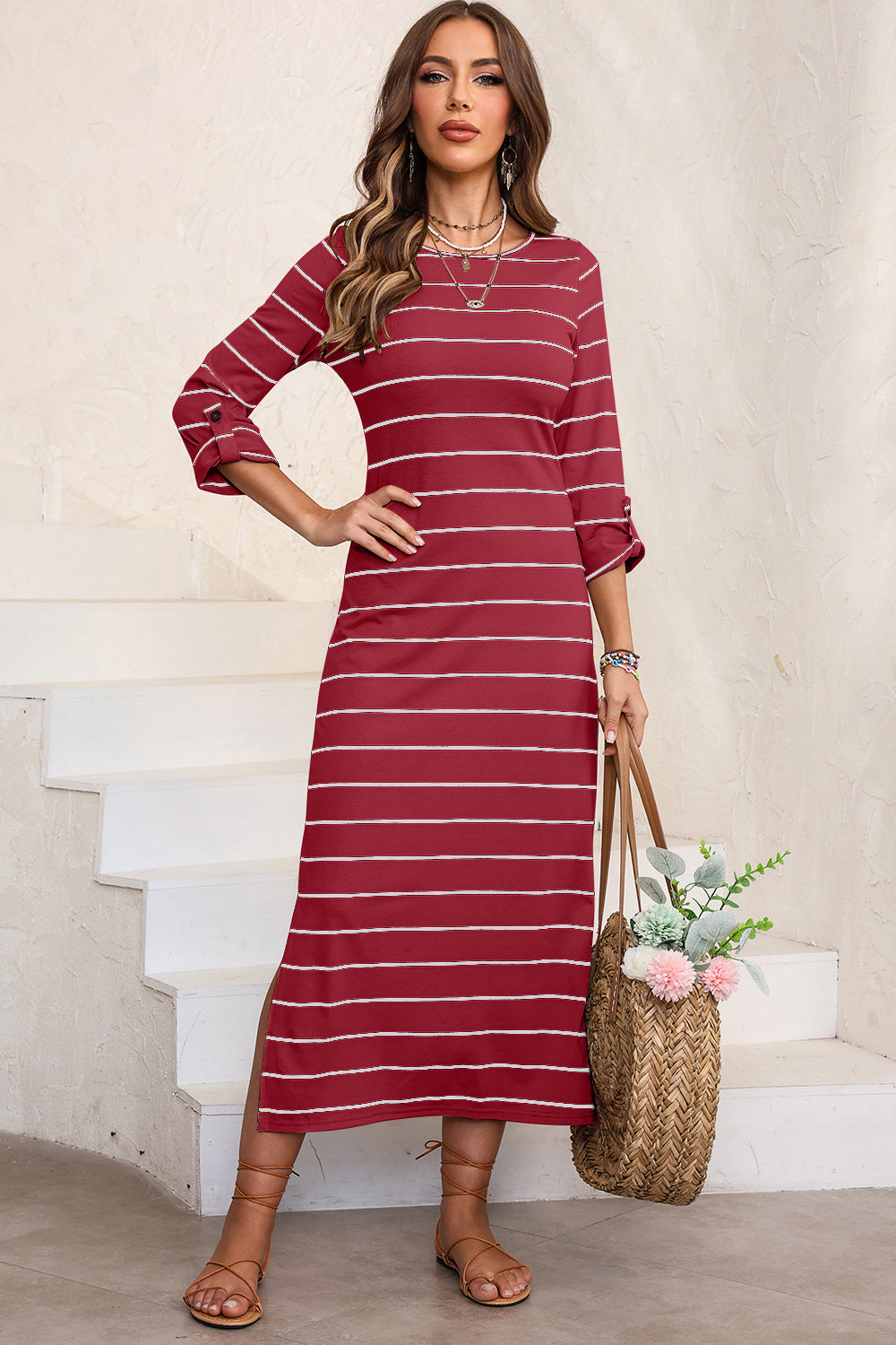 A stylish Slit Striped Round Neck Midi Dress featuring a backless design, slightly stretchy fabric, and elegant stripes, perfect for various occasions.