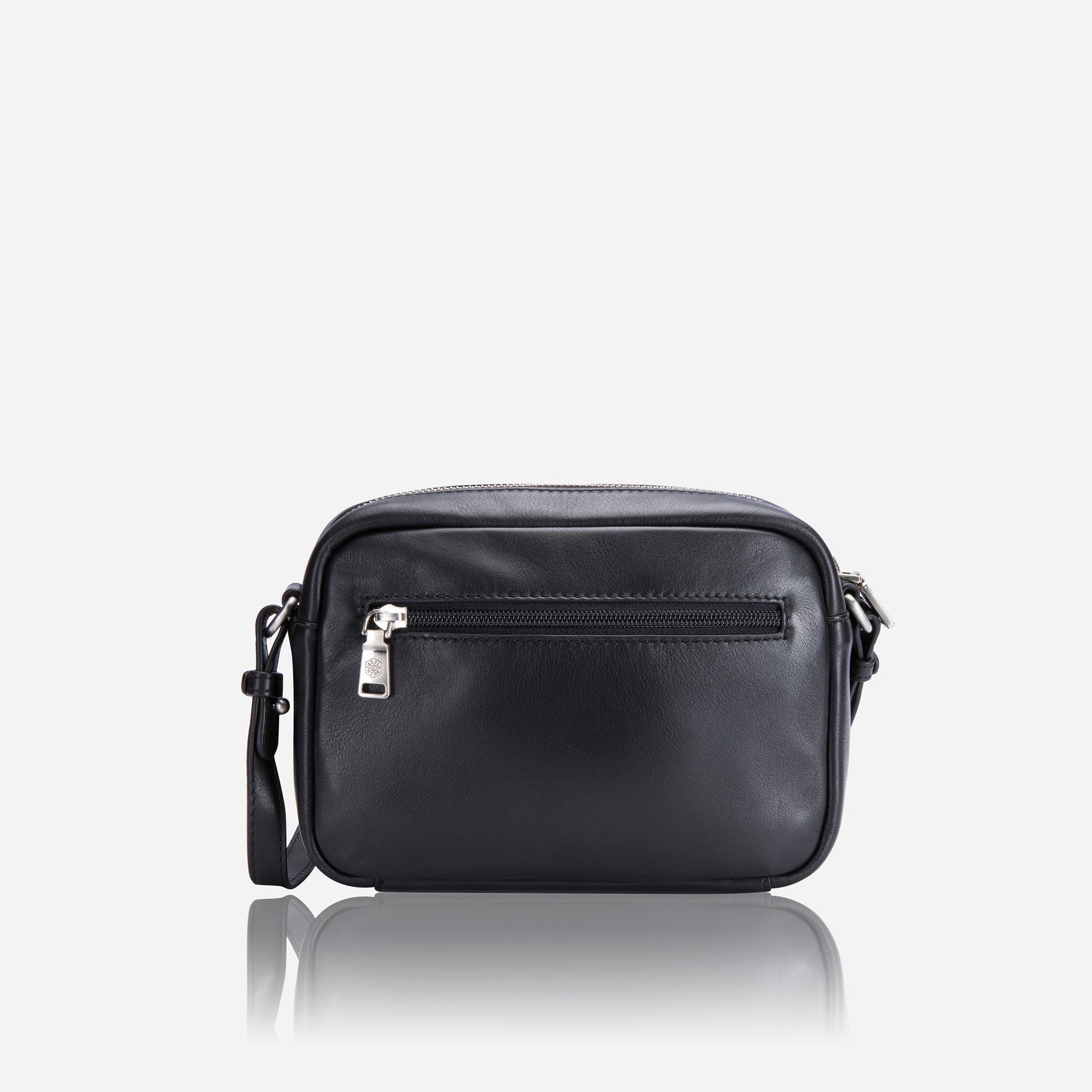 Small black crossbody bag with vibrant interior lining, stylish and compact design.