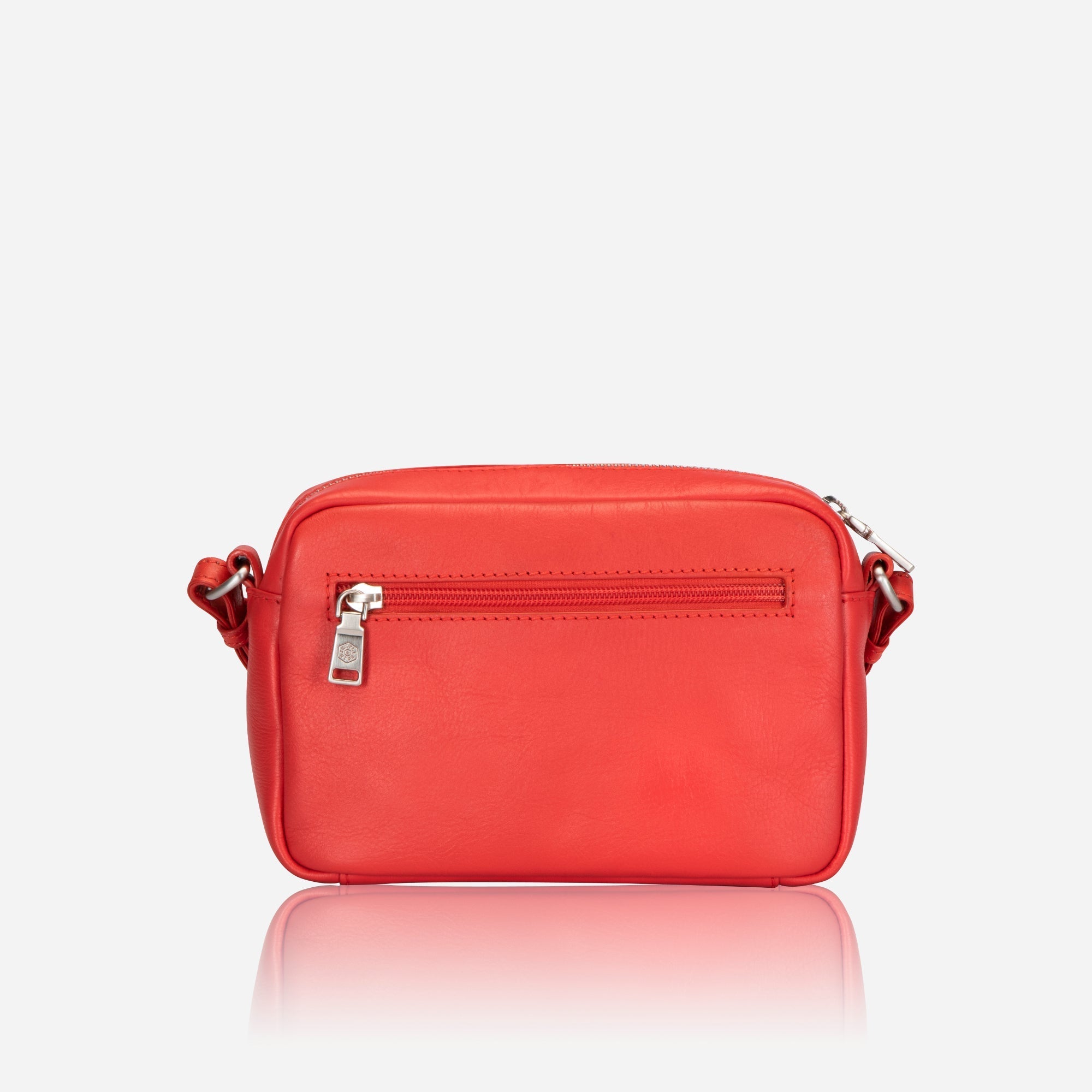 Small Crossbody bag in Candy Apple color with vibrant lining, showcasing its stylish design and compact size.