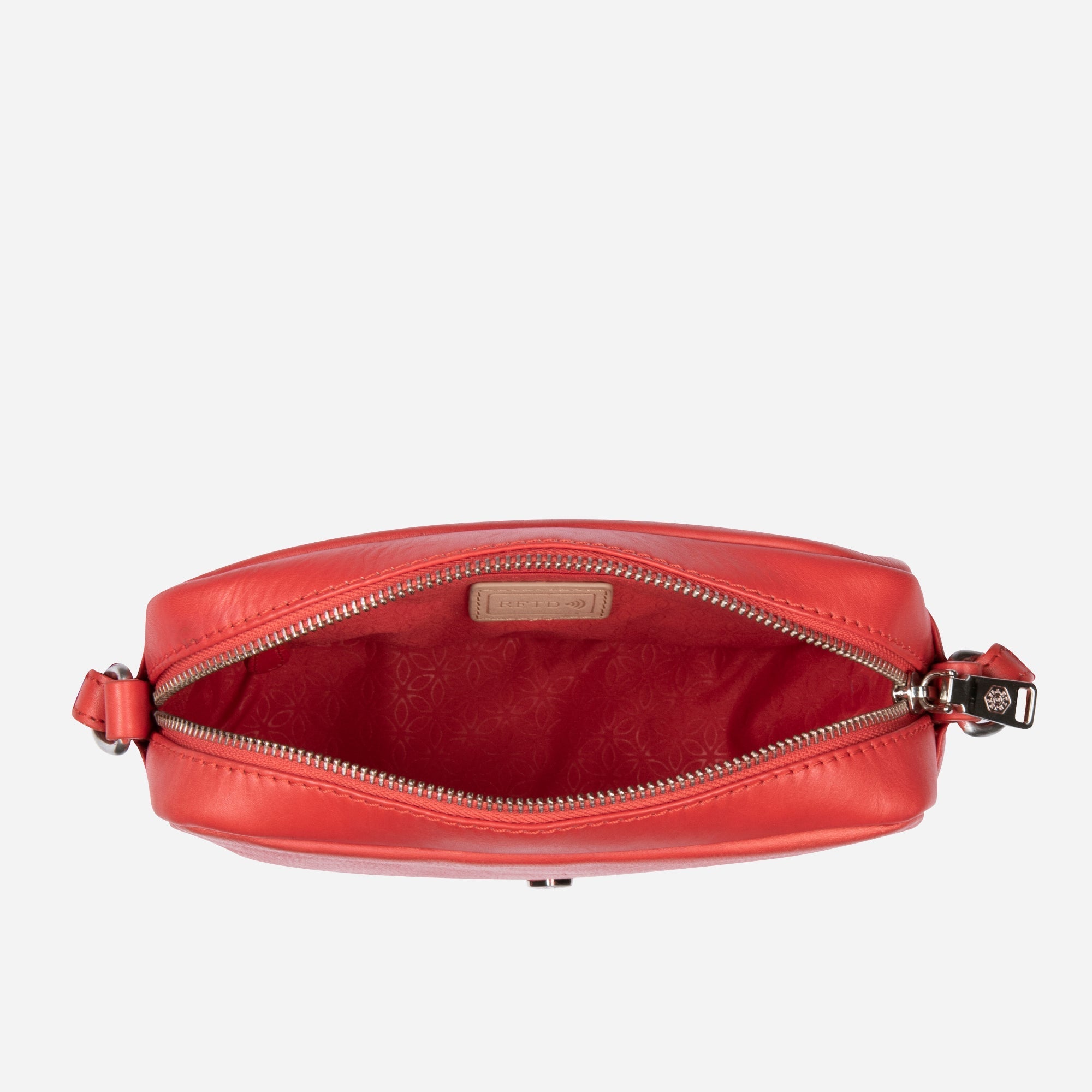 Small Crossbody bag in Candy Apple color with vibrant lining, showcasing its stylish design and compact size.