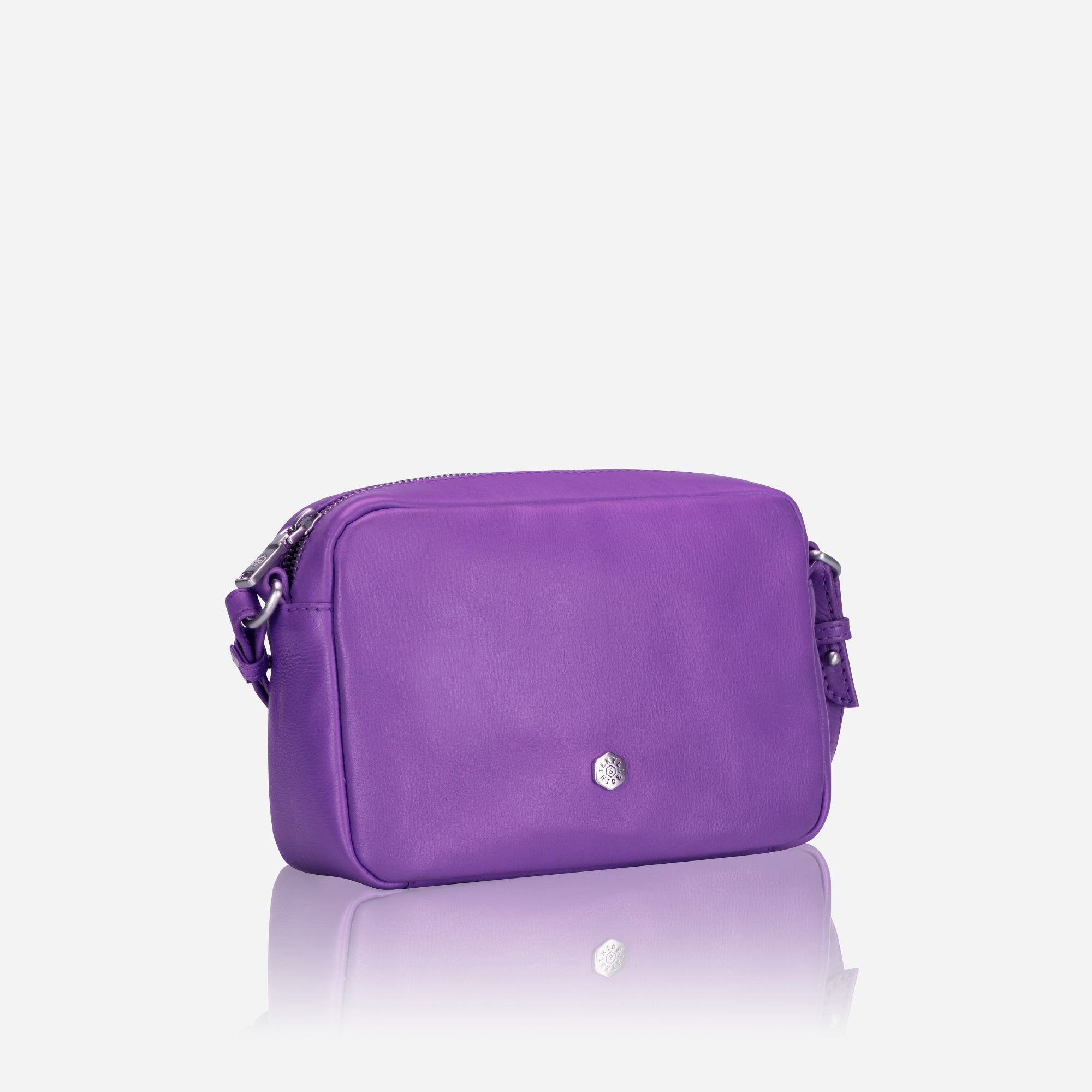 Small Crossbody bag in Electric Iris color with vibrant lining, showcasing its sleek design and spacious interior.