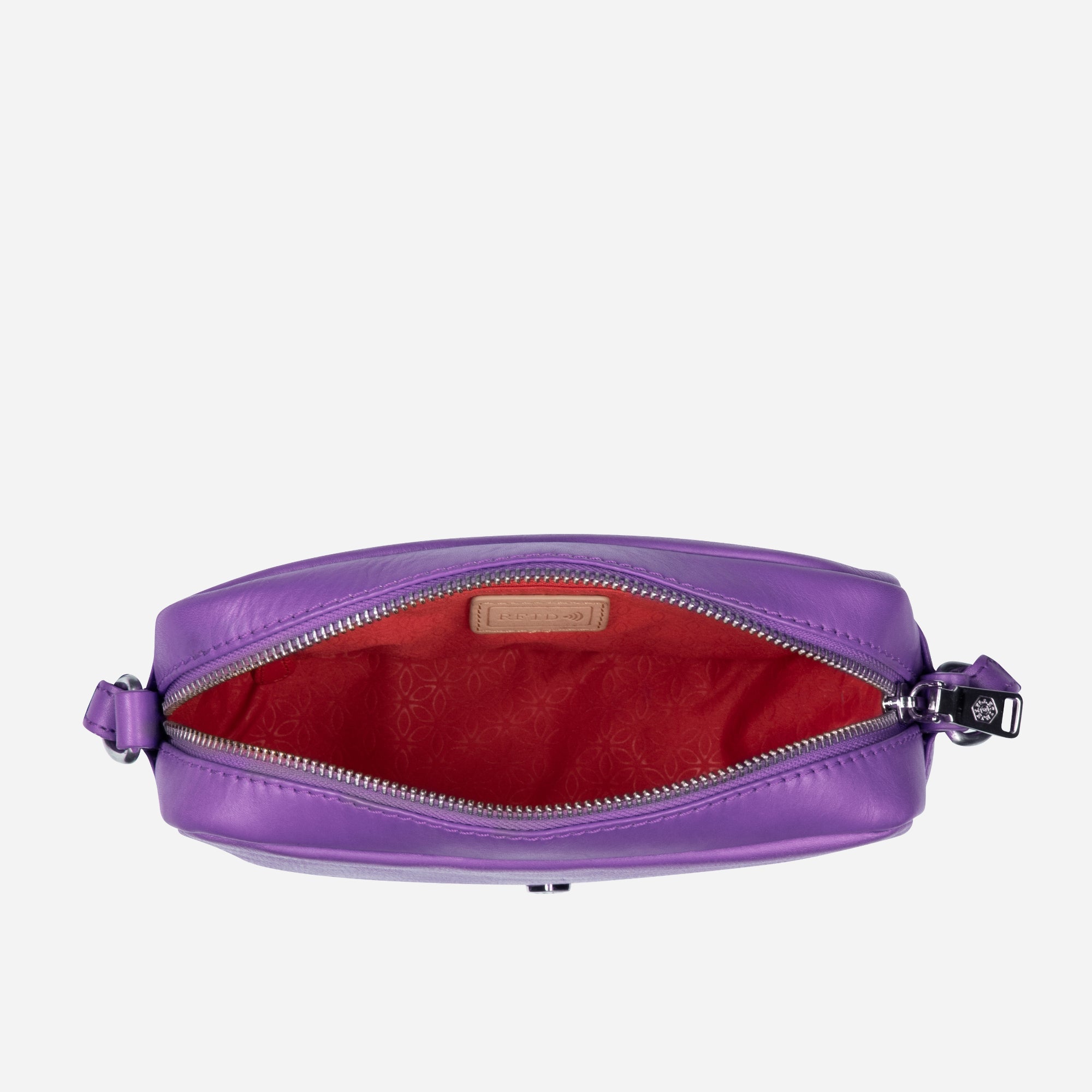 Small Crossbody bag in Electric Iris color with vibrant lining, showcasing its sleek design and spacious interior.