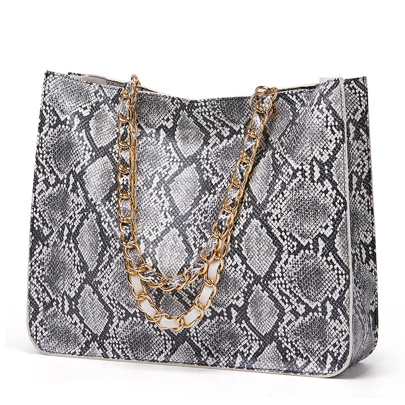 Stylish snake pattern messenger bag in various colors, showcasing its large capacity and double straps.