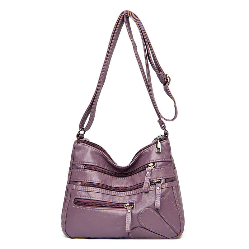 Soft leather large capacity shoulder bag in various colors, designed for middle-aged women, showcasing its stylish and spacious design.