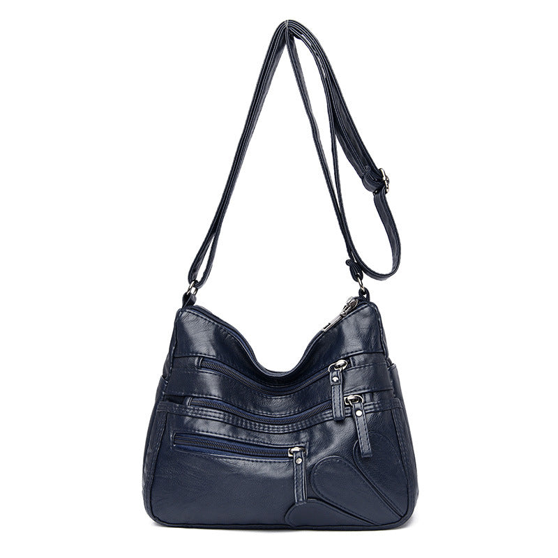 Soft leather large capacity shoulder bag in various colors, designed for middle-aged women, showcasing its stylish and spacious design.